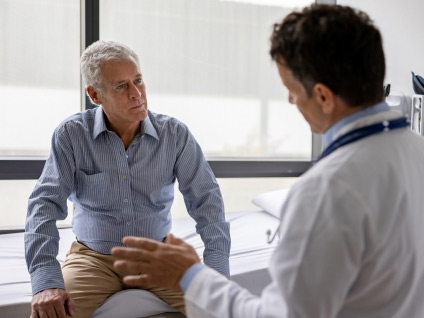 doctor speaking with a patient